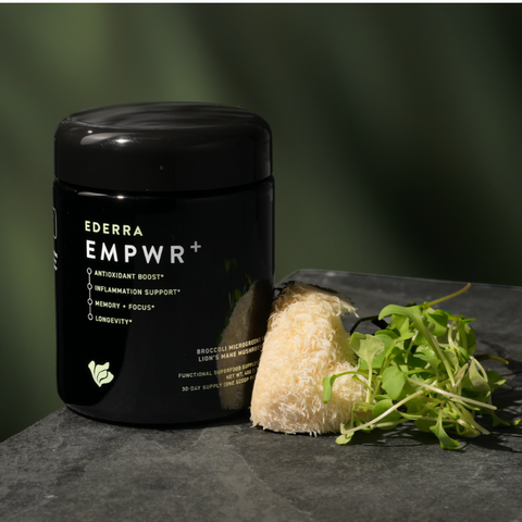 Picture of EDERRA EMPWR+ Broccoli Microgreens Lion's Mane Mushroom Functional Superfood Supplement. Biophotonic Glass Jar next to Fresh lion's mane and fresh broccoli microgreens